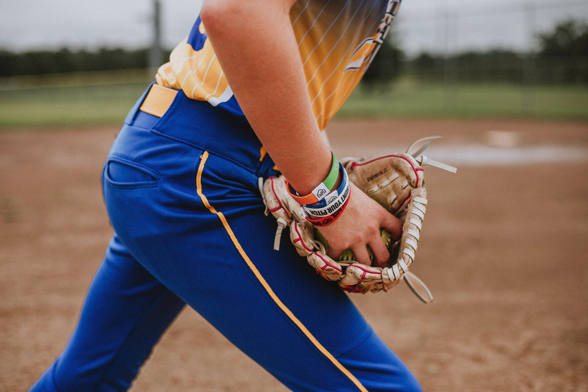 Own the Box. Own Your Pitch.™ TAP Band | Red Message Confidence Wristband for Softball & Baseball